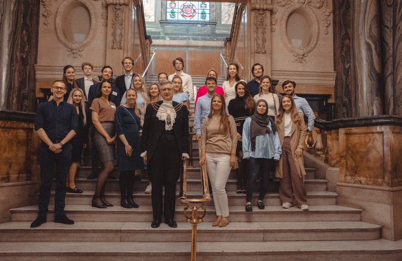 A photo of a group of people on stairs