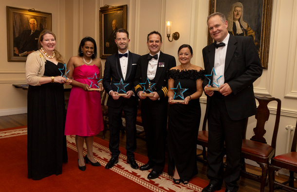 Photo of the winners: Lucinda Orr, Sira Abraham, Chris Loweth, Cdr Mark Blackwell, Fiona Butler, and Daniel Lee on behalf of GLD Winsor Fwork Team