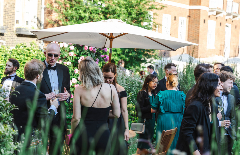 A photo of dressed up people outside