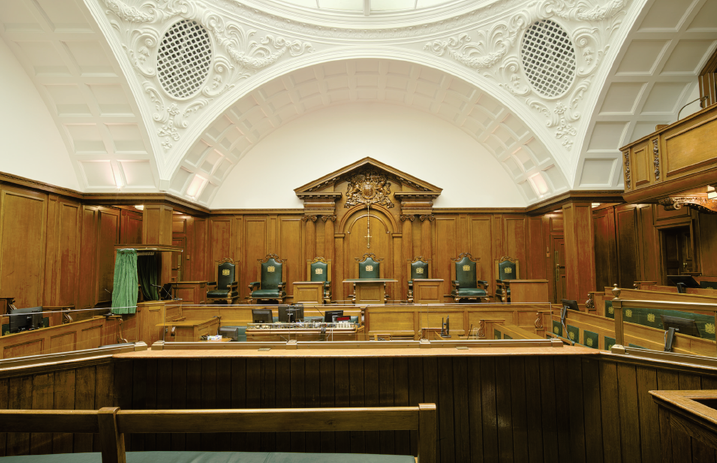 A photo of inside a courtroom in the Old Bailey building 